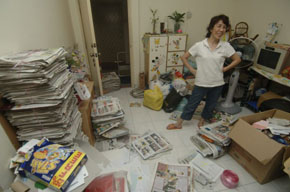 Chin Chu Lin, a recycling volunteer in Malaysia, visits people in her neighborhood and collects their recyclables. Both by Yan Lin-Zhao.