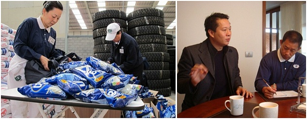 (Left photo) Tzu Chi volunteers prepare goods for distribution in a warehouse provided by tire importer Xie Zhen-xiang (right photo, left), who talkds with volunteers from the United States about distribution details.