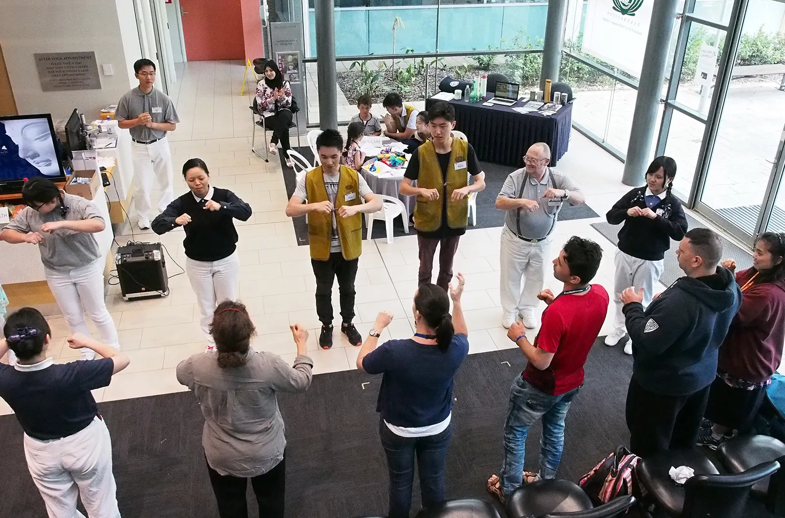 Perth - Perth Free Dental Clinic - Volunteers performed sign-language songs and interacted with patients Perth Free Dental Clinic - Volunteers performed sign-language songs and interacted with patients