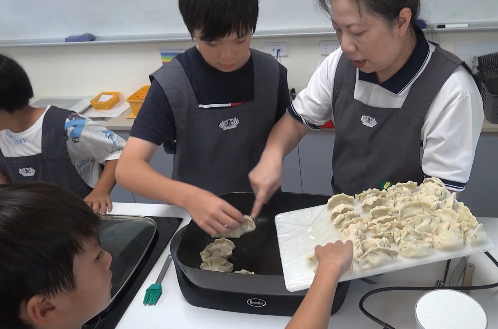 Perth - Vegetarian Promotion - The principal and teachers prepared fillings and dough for vegetarian dumplings Vegetarian Promotion - The principal and teachers prepared fillings and dough for vegetarian dumplings