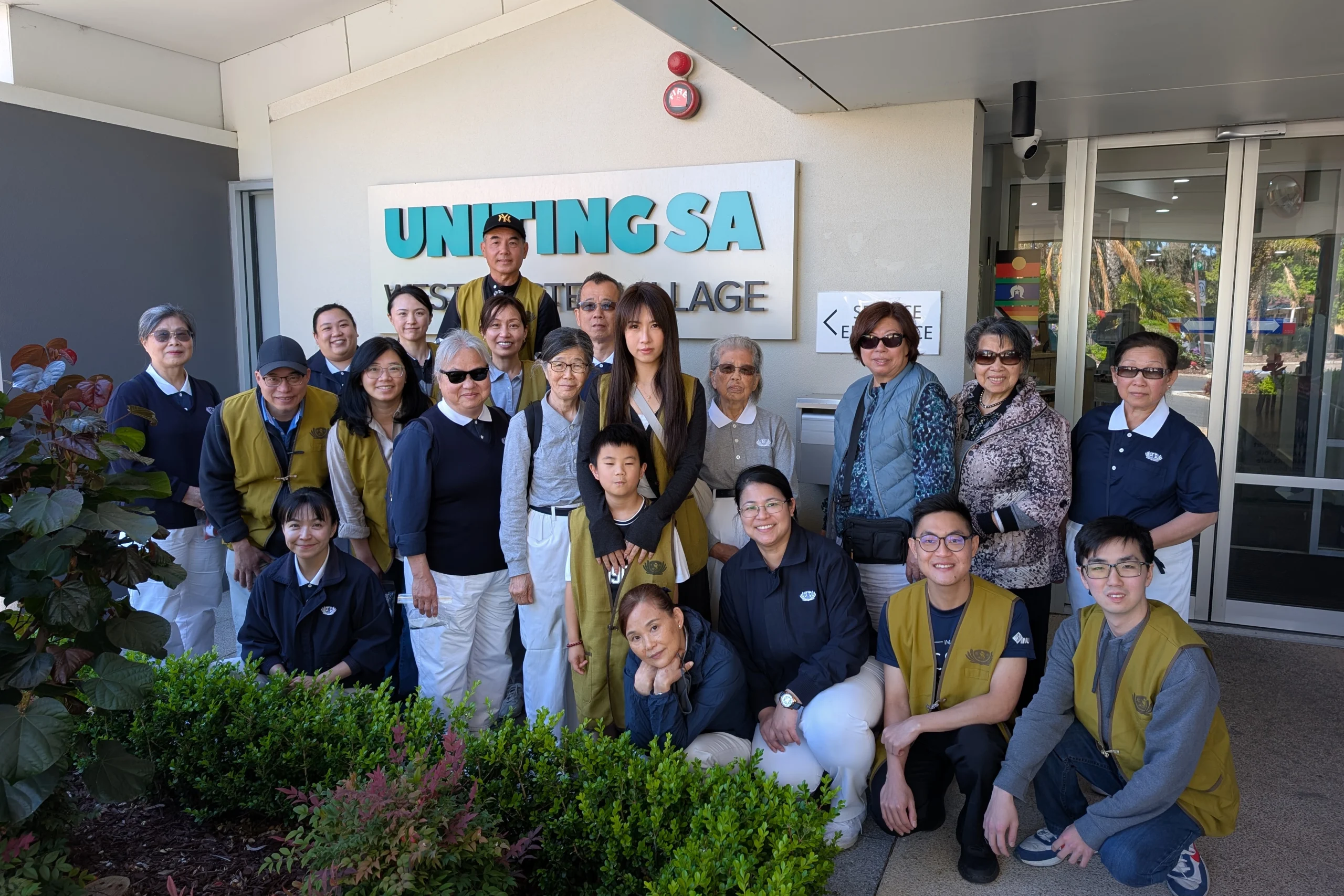 Tzu Chi Integrative Community Health and Wellness Centre - Group photo of passionate volunteers in front of the nursing home.