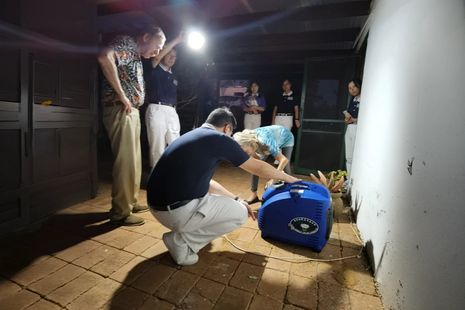Tzu Chi Integrative Community Health and Wellness Centre - One week after the storm, volunteers brought a generator to a vulnerable family during disaster assessment visits