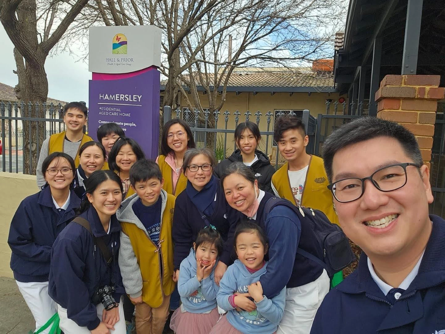 Tzu Chi Integrative Community Health and Wellness Centre - Volunteers taking a group photo together at the entrance of Hamersley Nursing Home.
