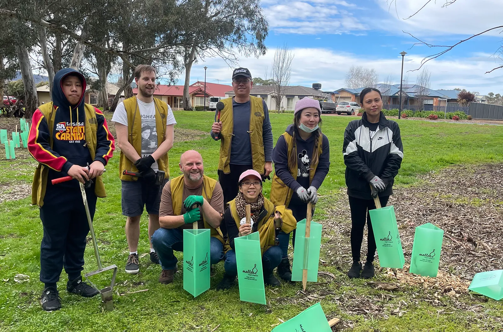 Adelaide - Tree Planting Day - Participants from diverse backgrounds engage in a tree planting activity ree Planting Day - Participants from diverse backgrounds engage in a tree planting activity
