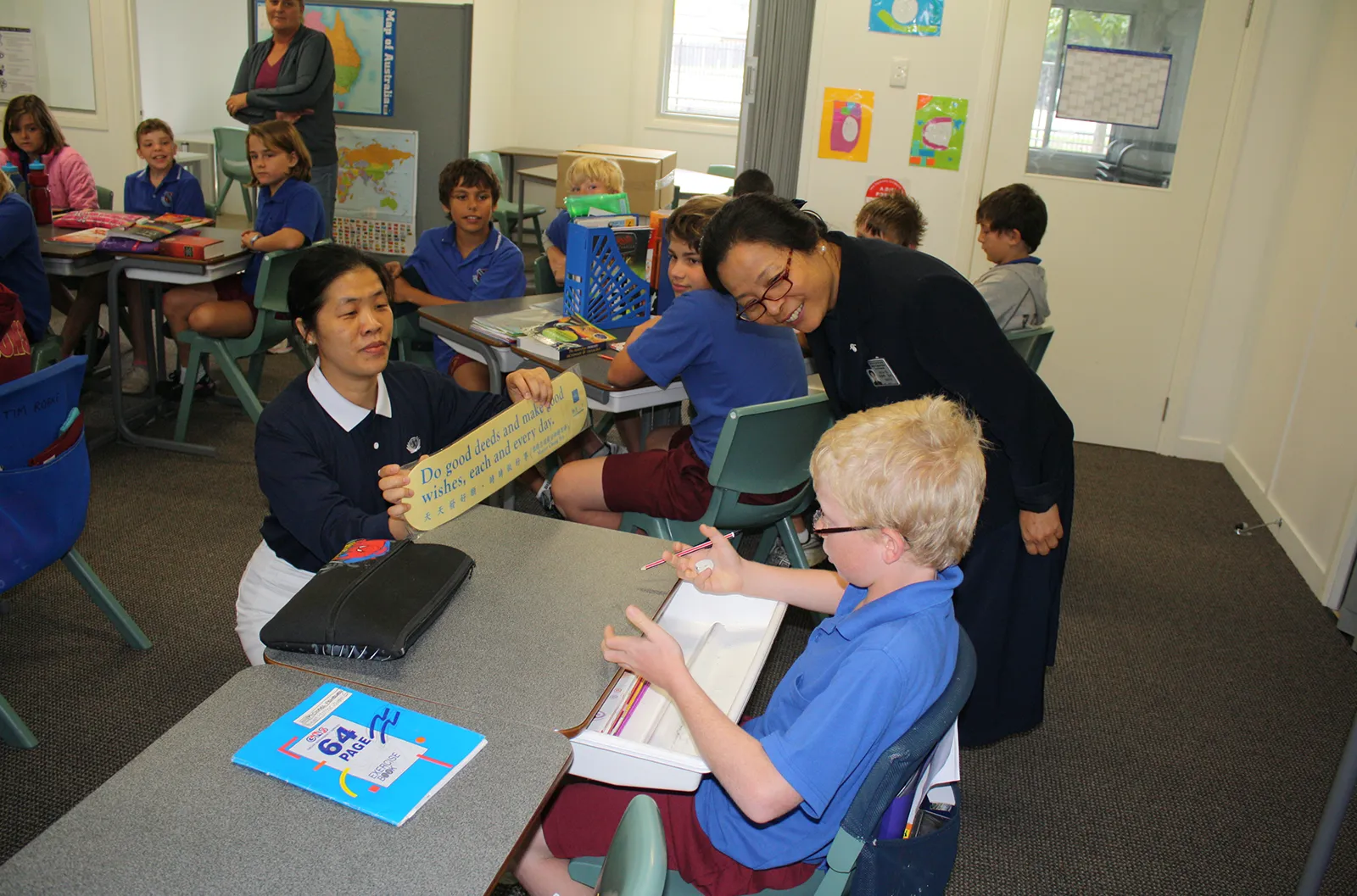 dentalwebsite -Disaster Relief – 2011 – 2011 – Sharing Jing Si Aphorisms at Brassall State School (Photo by Peter Lin) Disaster Relief – 2011 – 2011 – Sharing Jing Si Aphorisms at Brassall State School (Photo by Peter Lin)